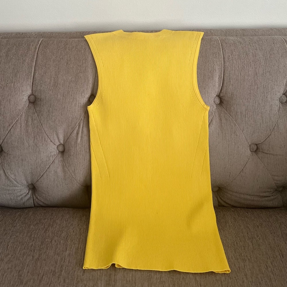 Hugo Boss sleeveless tops, fantastic quality. Very beautiful fit.Practically new